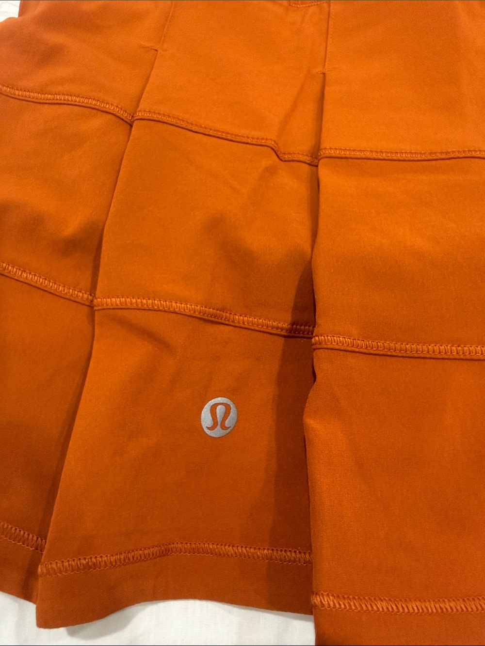 lululemon athletica Pace Rival MR Skirt in burnt orange with white tag - Picture 4 of 9